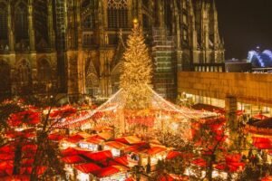 Christmas market at Cologne Cathedral (Photo by Ying Tang/NurPhoto via Getty Images)