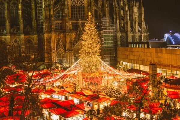 Christmas market at Cologne Cathedral (Photo by Ying Tang/NurPhoto via Getty Images)
