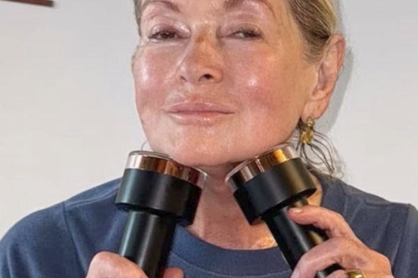 Martha Stewart holding two Lyma Laser Pros to her face.